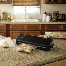 Load image into Gallery viewer, FoodSaver Vacuum Sealer System with Starter Bags &amp; Rolls
